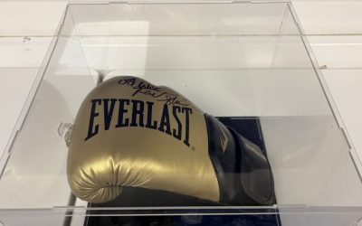 Signed boxing glove raising funds for academy